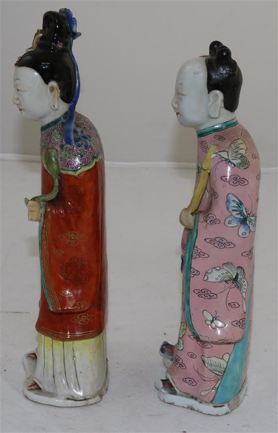 Two Chinese famille rose enamelled figures of female immortals, late 18th century, 26 and 24.5cm, losses and restoration